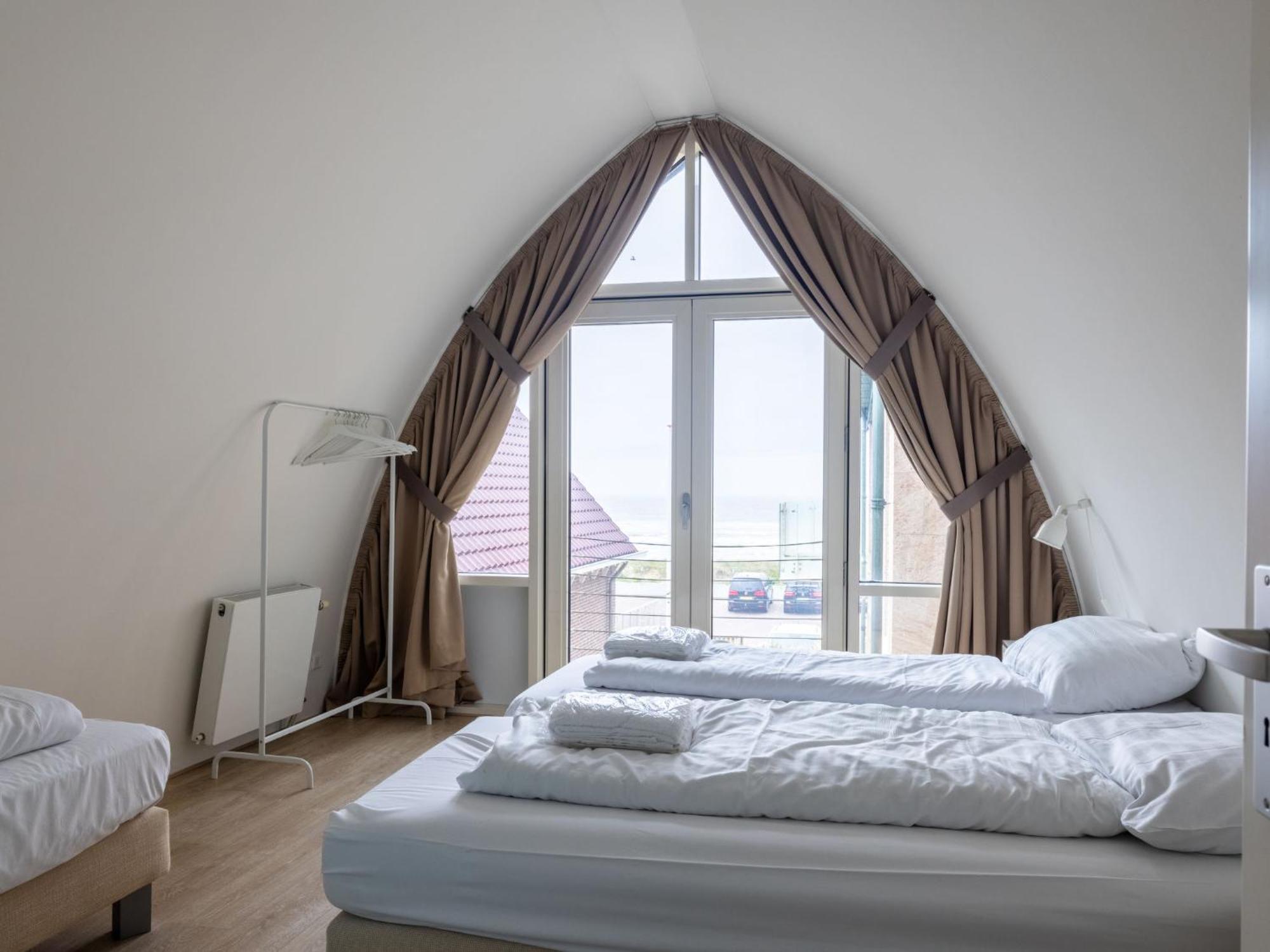 Holiday Home De Zeeparel 에크몬드안지 외부 사진